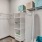 large closet with shelves and hangers
