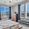 bedroom with bed and large windows