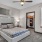 bedroom with bed and wall art