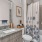 bathroom with bathtub and large mirror