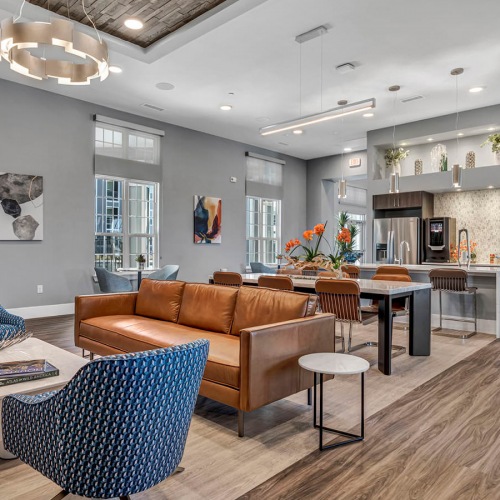 brightly lit clubhouse with kitchen